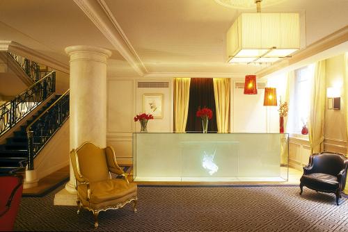 hotel lobby desk. Hair dryer in the desk.