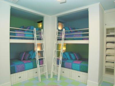 These cute bunk beds sleep four kids